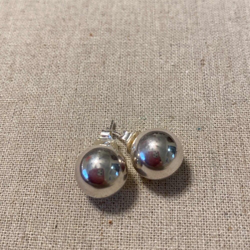 Little Silver ball post earrings.